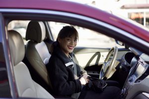 young woman in car smiling 2024 12 06 18 56 05 utc Steffy Driver